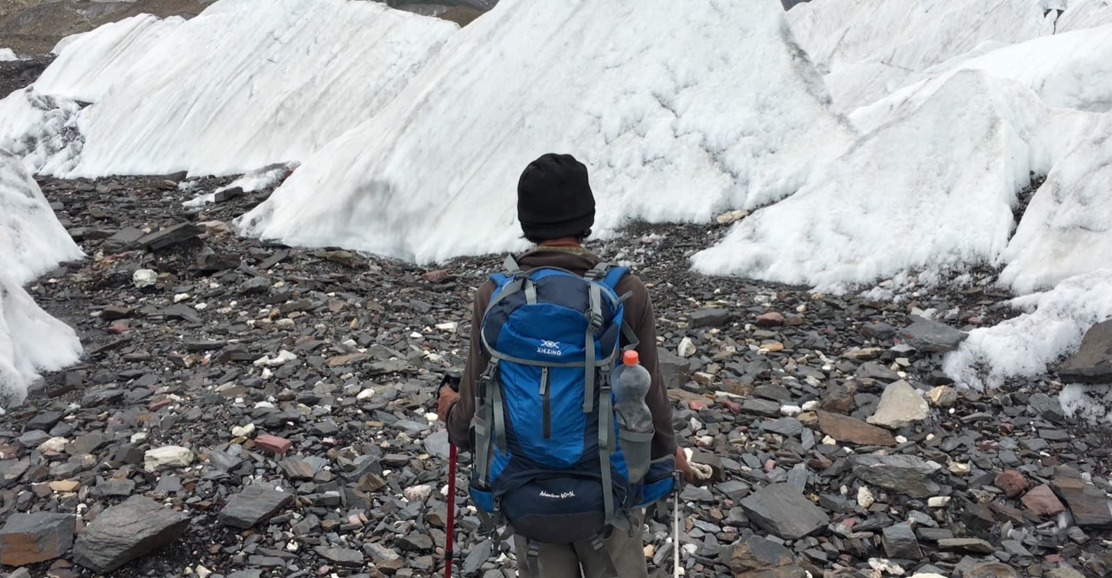 A Third Pole Adventures field guide crossing the Baltoro Glacier
