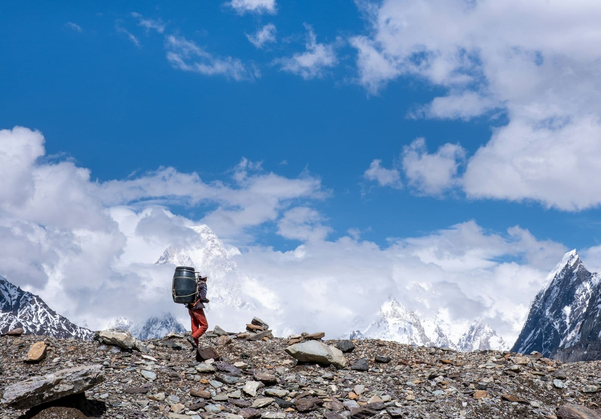 Porter on the Baltoro Glacier below Gasherbrum IV